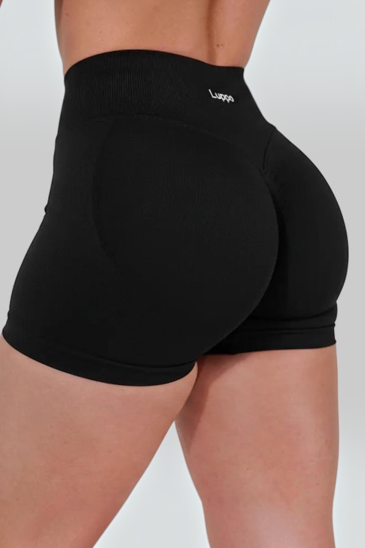 LUPPO black high-waist workout shorts with glute contouring and scrunch detail, featuring a wide supportive waistband.