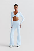 LUPPO light blue long sleeve twist front crop top with cut-out and flared leg pants set