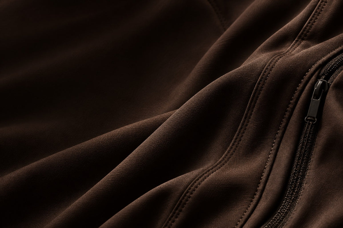 Espresso performance fabric, sculpted folds and fine stitching