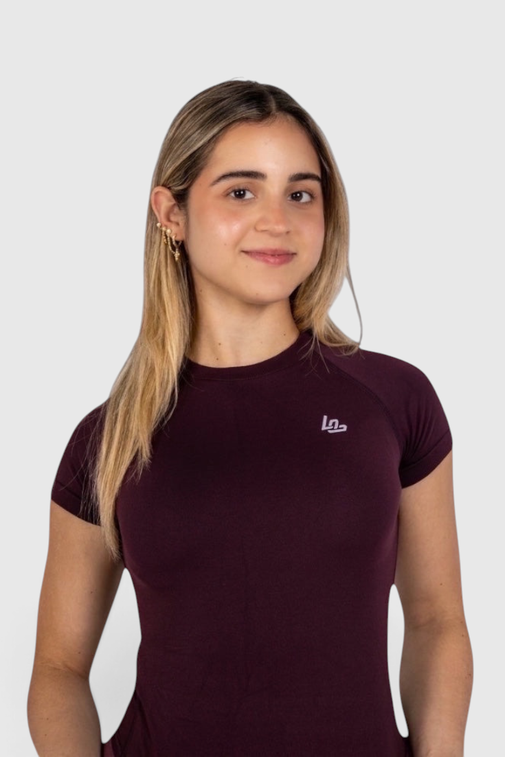 LUPPO Sculpt Tee in deep burgundy with raglan cap sleeves, twill knit contouring, and logo detail on the chest.